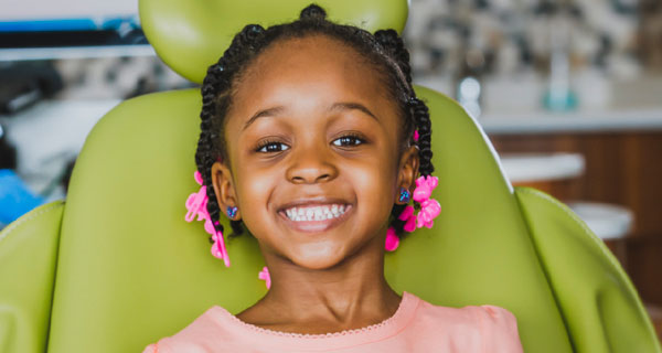 Photo of girl in dentist chari